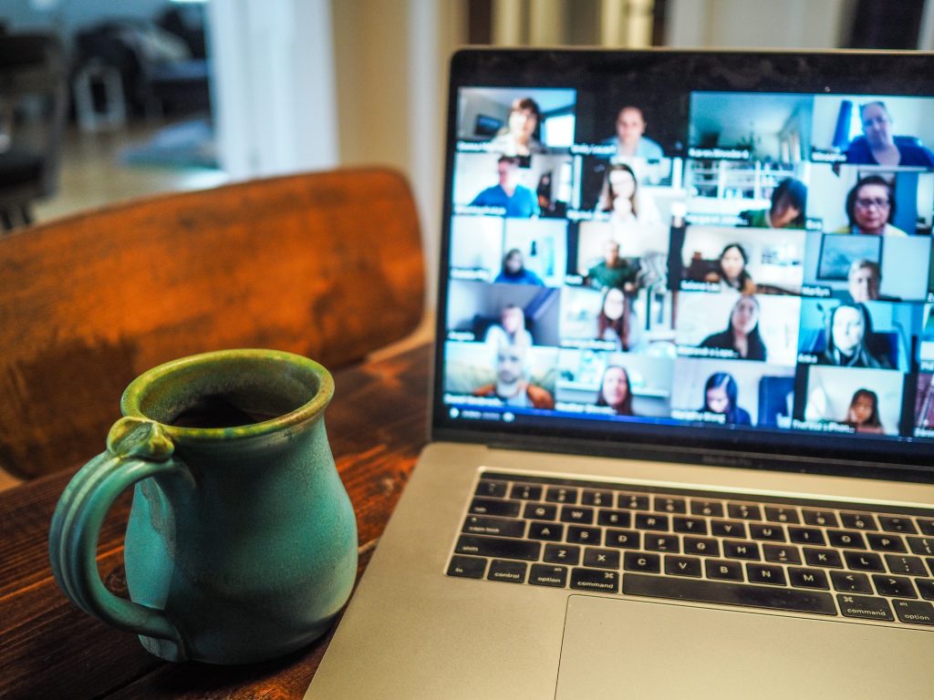 video meeting on laptop and mug